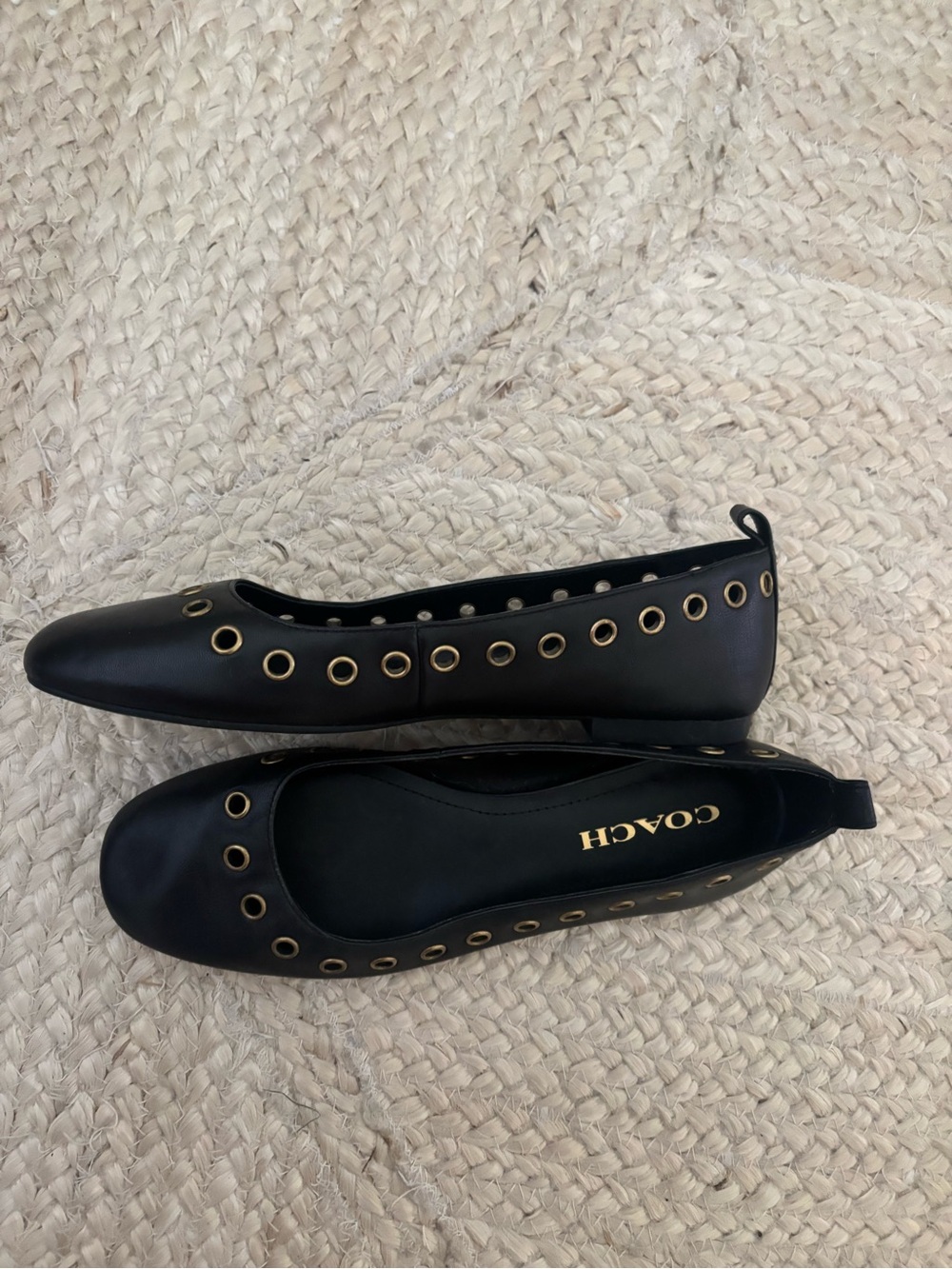 Coach Black Leather Grommet Ballet Flats with Gold Accents